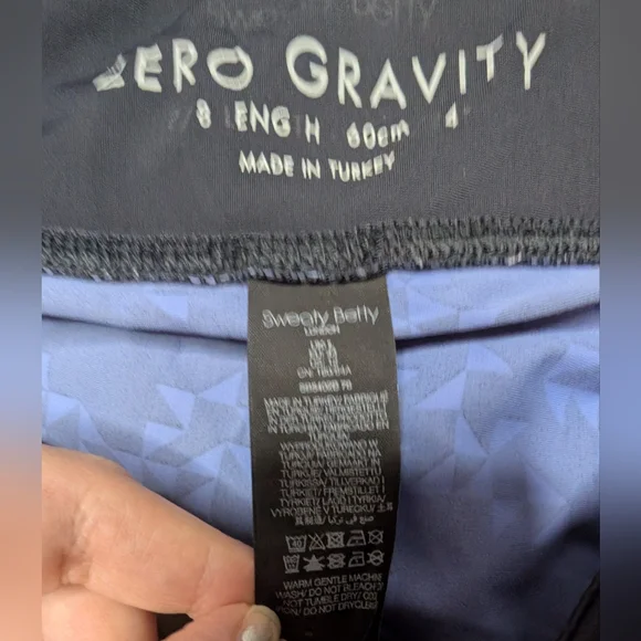 Sweaty Betty L (US 12) Zero Gravity 7/8 Length Black with Light Blue Geometric - Picture 8 of 14